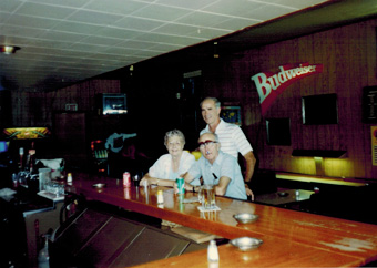 Gordon Peterson and his parents Ray and Iva at the North End Tavern<br>
in Lovilia, Iowa.