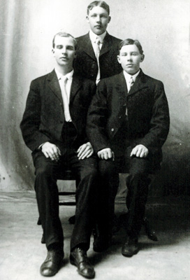 Brothers David (left) and John (right) Peterson with friend John